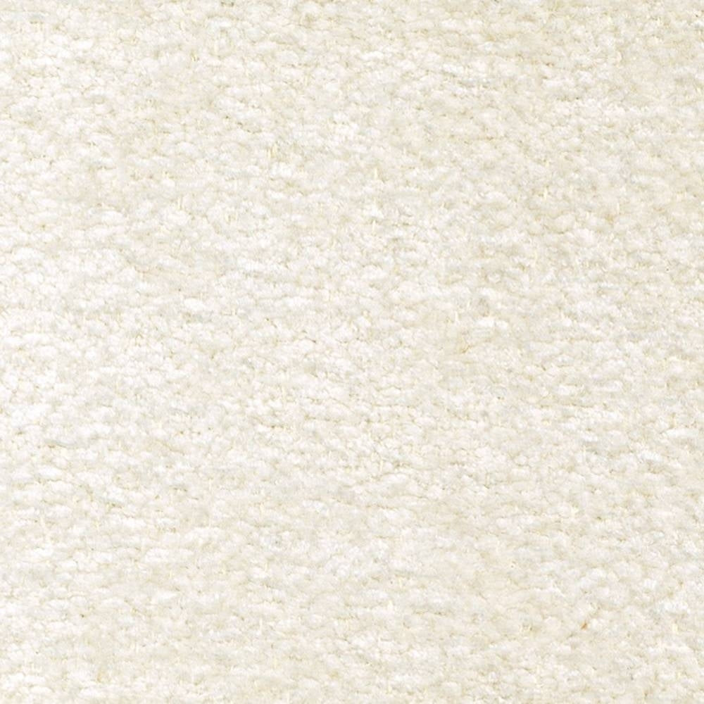 Close-up of cream boucle upholstery fabric showing soft, nubby texture; 87% polyester with 6% linen and 7% rayon, suitable for indoor sofa upholstery.