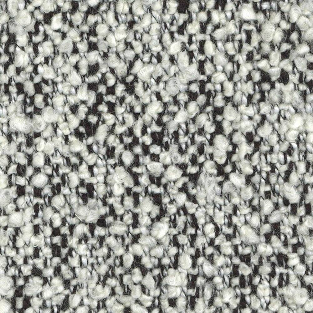 Close-up of off-white boucle wool-blend upholstery fabric with looped texture and dark-gray flecks, showing the woven construction ideal for contemporary sofa upholstery.
