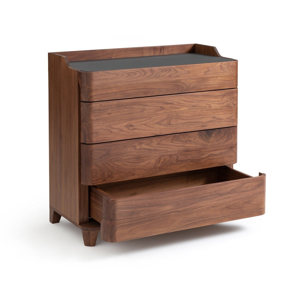 Solid walnut dresser with a matte black linoleum top, four rounded-front drawers with one pulled open, tapered legs and warm natural wood grain for a modern, contemporary bedroom or living space.