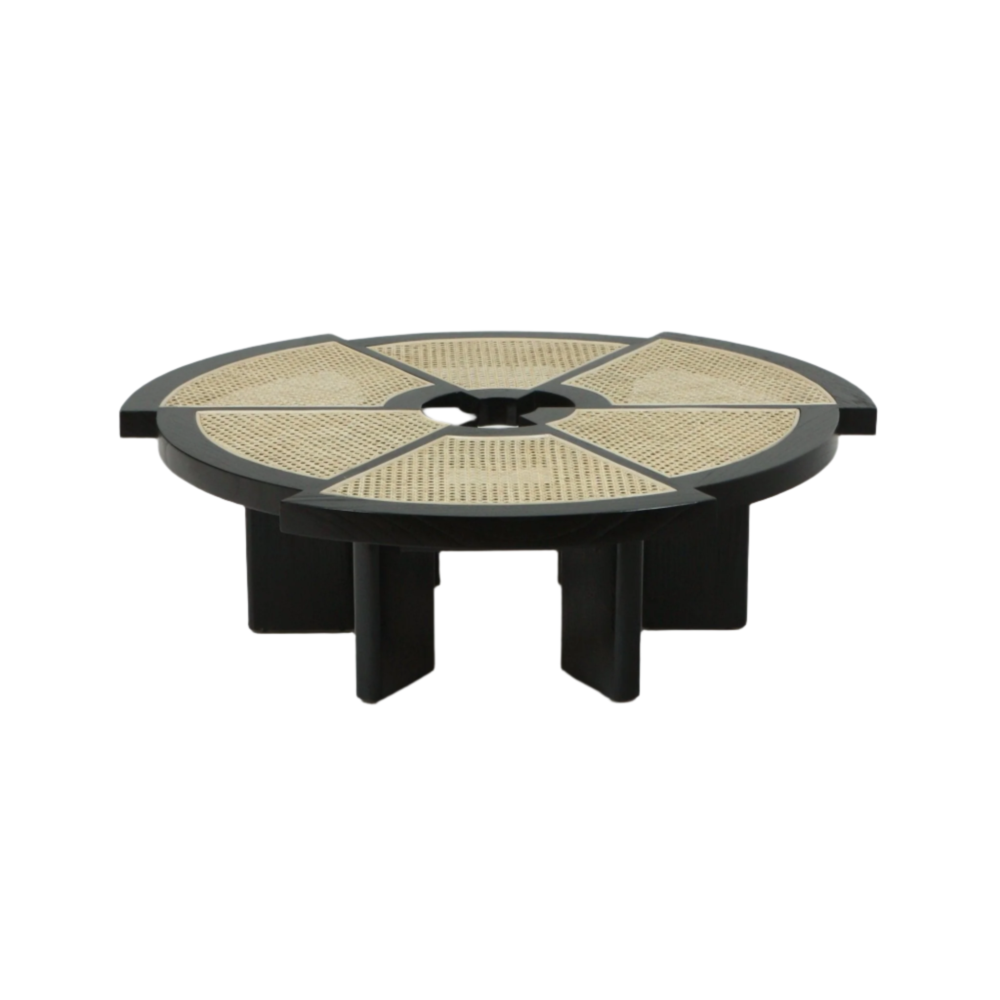 Low round modern coffee table with a black wooden frame and natural cane insets arranged in segmented triangular panels around a small central opening, supported by a sculptural geometric pedestal base.