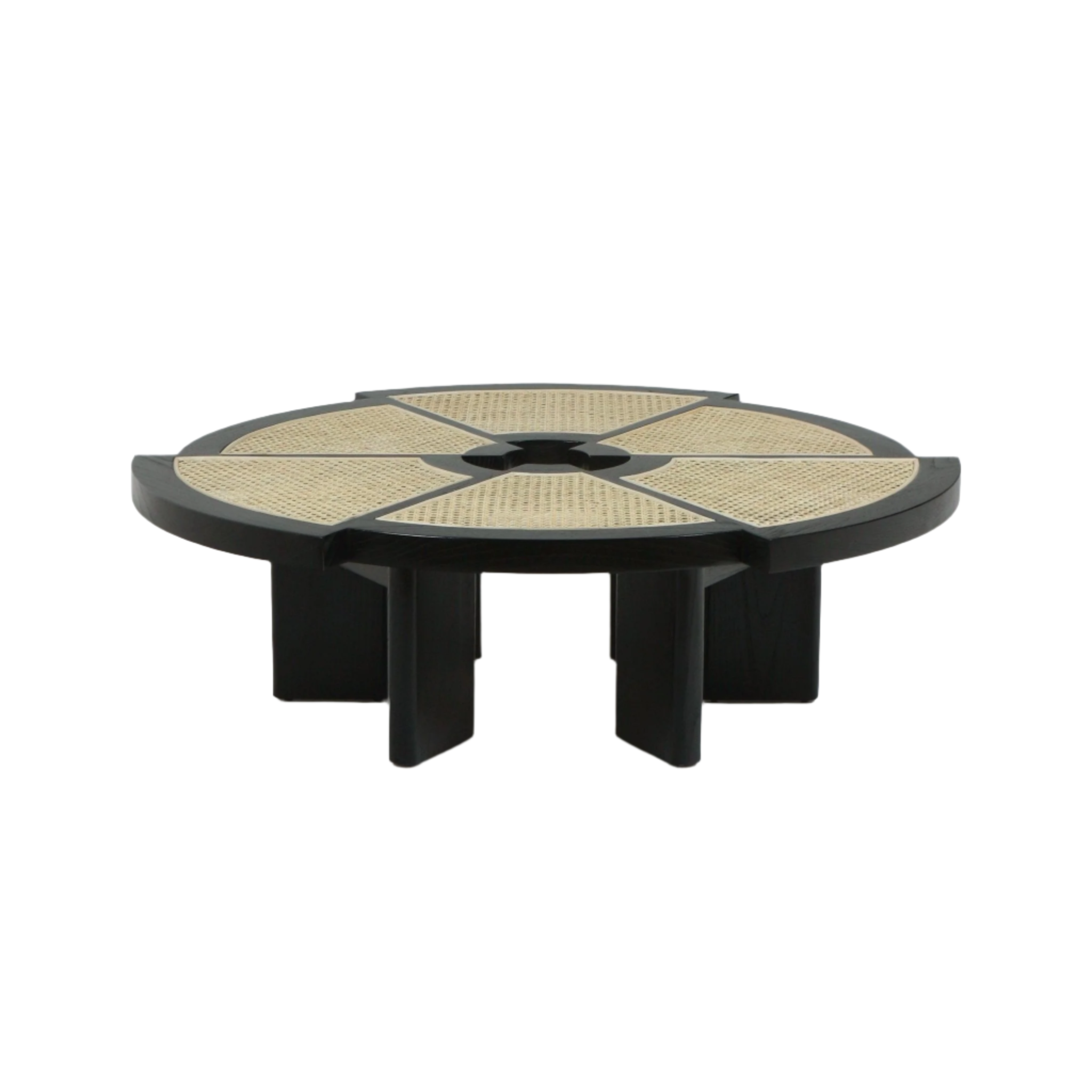 Modern low round coffee table with a black wood frame and six natural cane insets forming a radial pattern around a small central opening, supported by chunky segmented black legs.